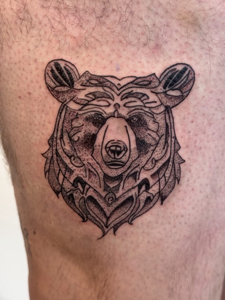 Dotwork and blackwork bear head tattoo